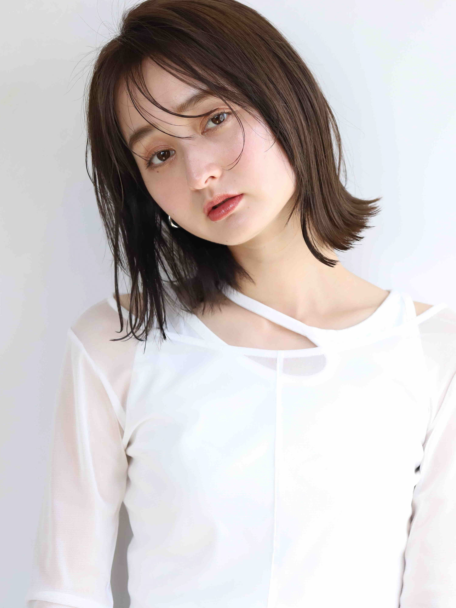 髪質改善で柔らかなツヤを出した大人女性のボブ